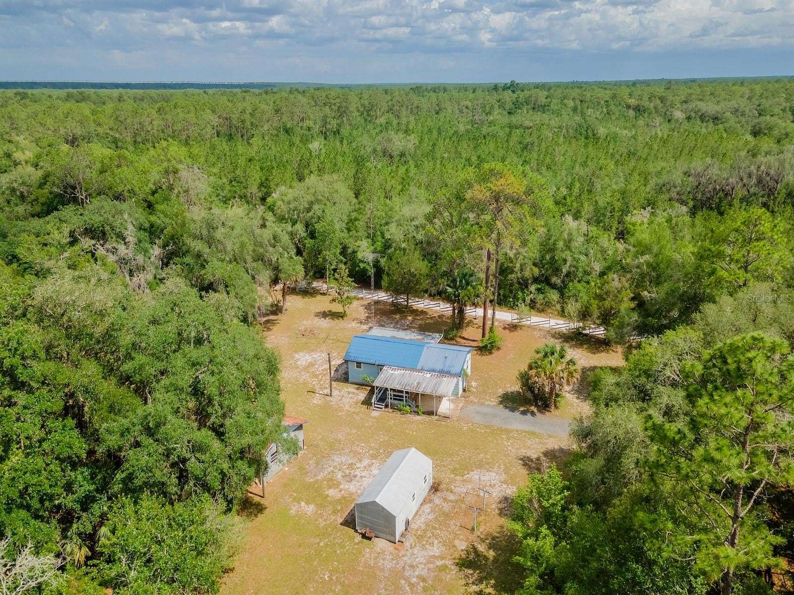 1.63 Acres of Land with Home for Sale in Fort McCoy, Florida