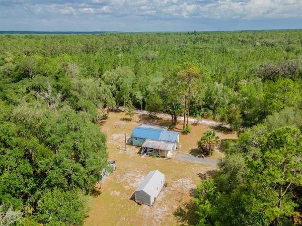 1.63 Acres of Land with Home for Sale in Fort McCoy, Florida