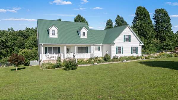 5.77 Acres of Land with Home for Sale in Petersburg, Tennessee
