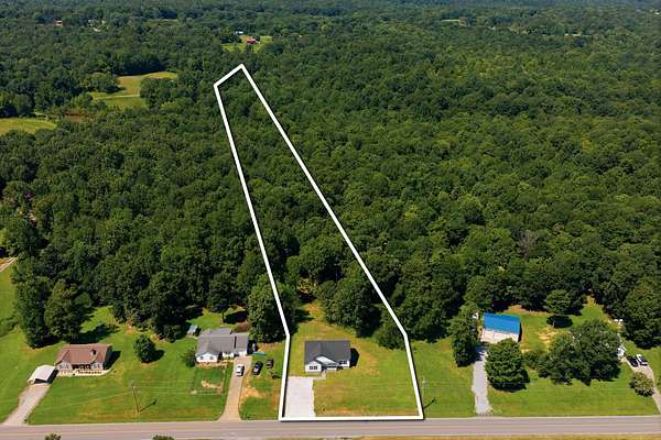5 Acres of Land with Home for Sale in Charlotte, Tennessee