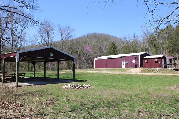 118 Acres of Recreational Land with Home for Sale in Reeds Spring, Missouri