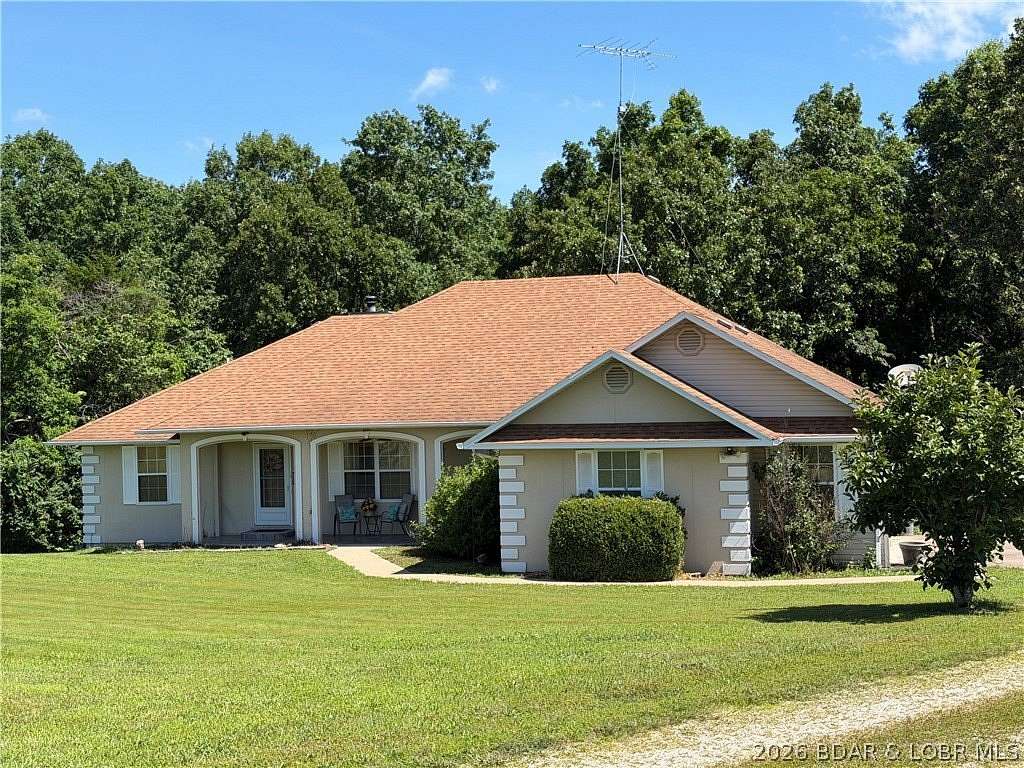 16.2 Acres of Recreational Land with Home for Sale in Eldon, Missouri