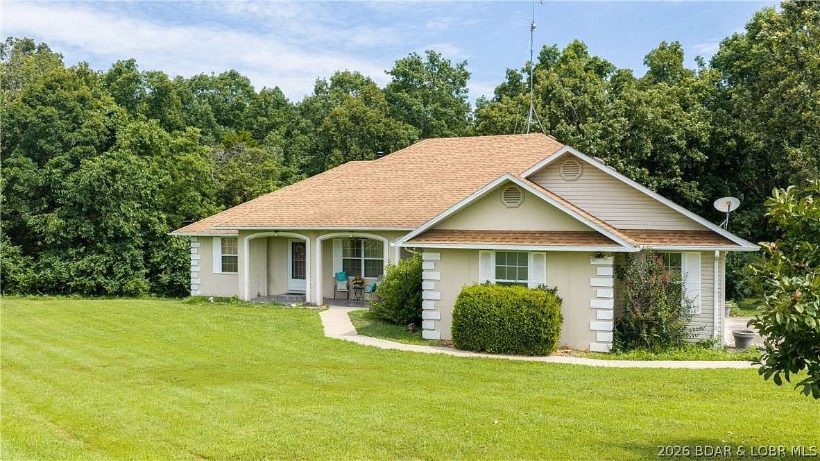 16.2 Acres of Recreational Land with Home for Sale in Eldon, Missouri