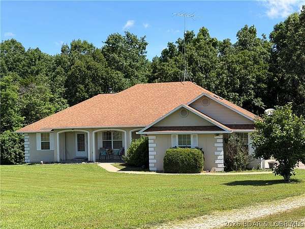 16.2 Acres of Recreational Land with Home for Sale in Eldon, Missouri