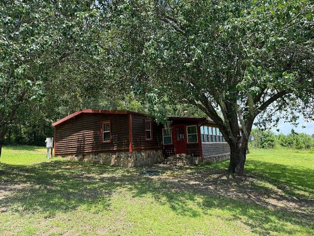 51.6 Acres of Land with Home for Sale in Cairo, Georgia