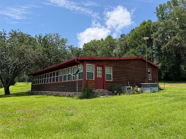 51.6 Acres of Land with Home for Sale in Cairo, Georgia