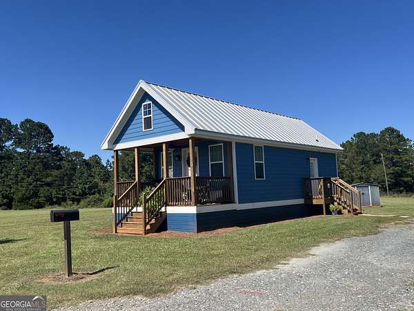 10.6 Acres of Land with Home for Lease in Forsyth, Georgia