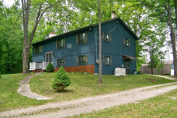 1.5 Acres of Land with Home for Sale in Elmira, Michigan