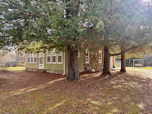 8.9 Acres of Land with Home for Sale in Farwell, Michigan