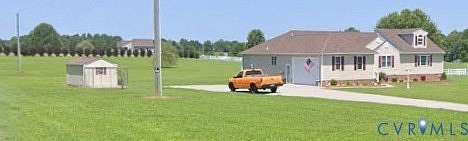 5 Acres of Land with Home for Sale in Spring Grove, Virginia