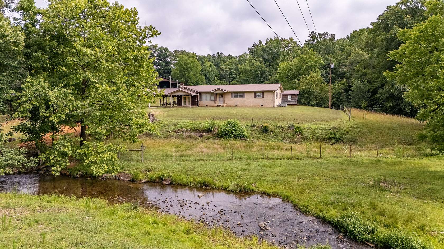 8.24 Acres of Land with Home for Sale in Lawrenceburg, Tennessee