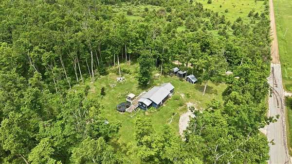 2.13 Acres of Land with Home for Sale in Alanson, Michigan
