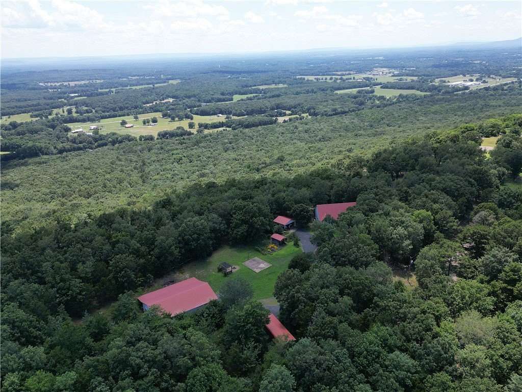 8.19 Acres of Land with Home for Sale in Pottsville, Arkansas