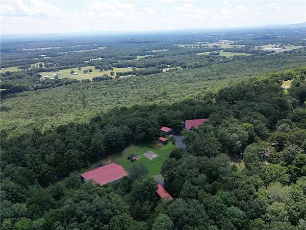8.19 Acres of Land with Home for Sale in Pottsville, Arkansas