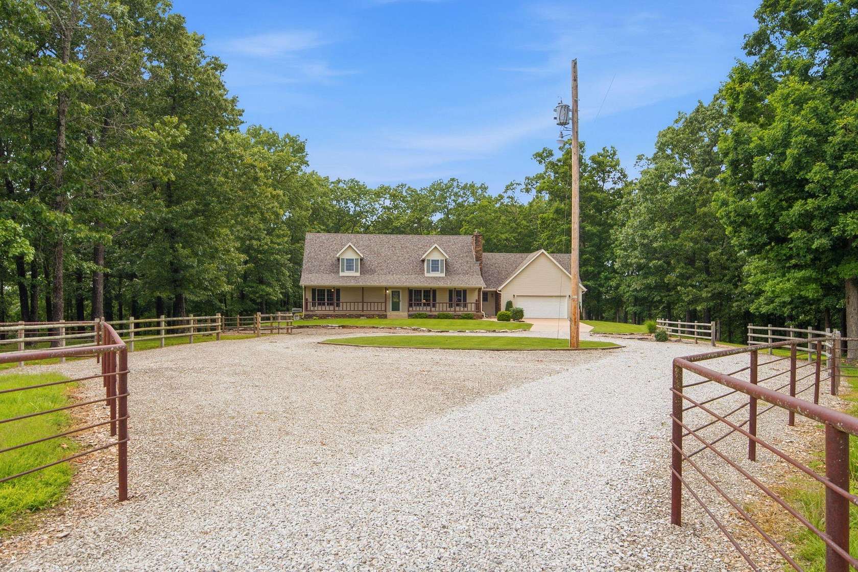 20 Acres of Land with Home for Sale in Highlandville, Missouri