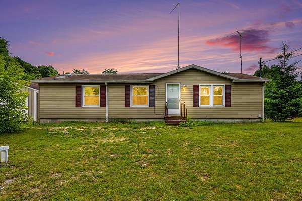7.36 Acres of Land with Home for Sale in Riverdale, Michigan
