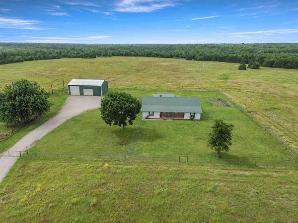 45.8 Acres of Agricultural Land with Home for Sale in Honey Grove, Texas