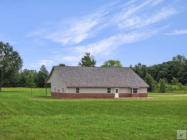 20 Acres of Agricultural Land with Home for Sale in New Boston, Texas