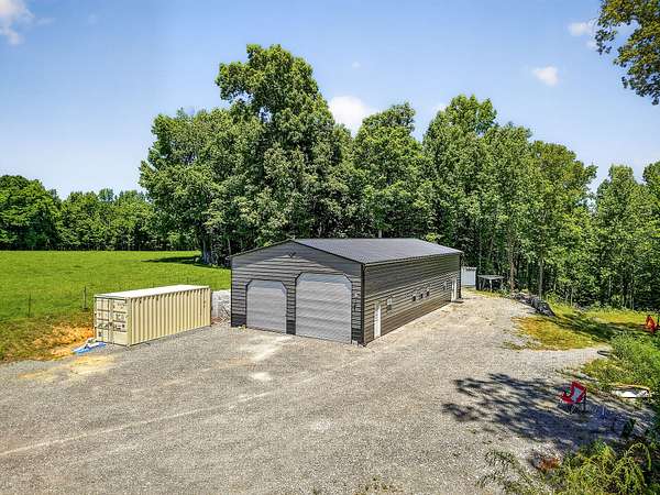 15.5 Acres of Land with Home for Sale in Alpine, Tennessee