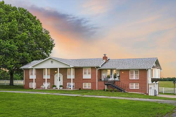 220 Acres of Land with Home for Sale in Stockton, Missouri