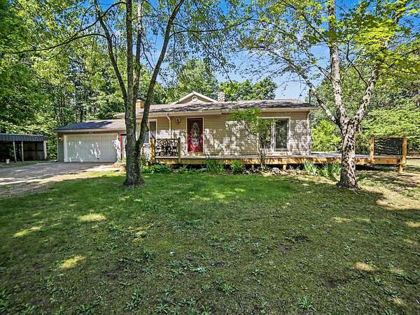 12 Acres of Recreational Land with Home for Sale in Hesperia, Michigan
