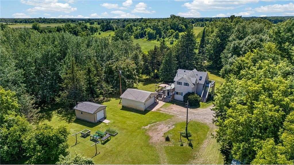 5.66 Acres of Land with Home for Sale in Rock Creek, Minnesota