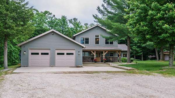 12 Acres of Recreational Land with Home for Sale in Rothbury, Michigan
