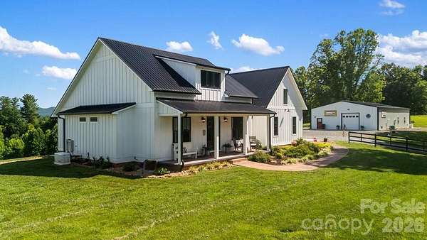 16.3 Acres of Land with Home for Sale in Marshall, North Carolina