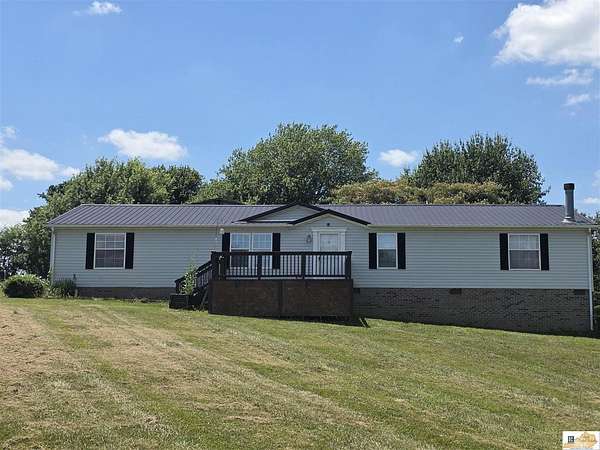 5 Acres of Land with Home for Sale in Park City, Kentucky