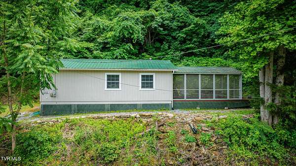 9.84 Acres of Land with Home for Sale in Eidson, Tennessee