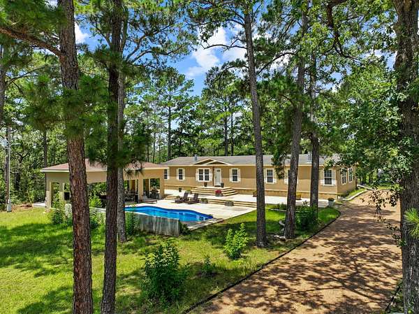 5 Acres of Land with Home for Sale in Smithville, Texas
