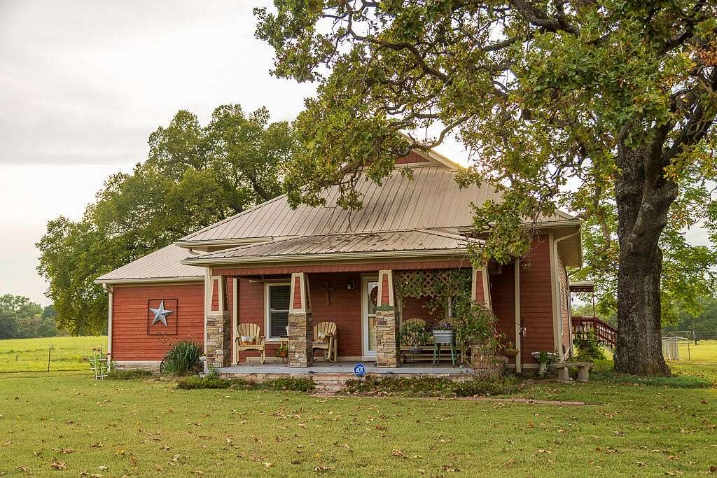 65.4 Acres of Land with Home for Sale in Nevada, Missouri