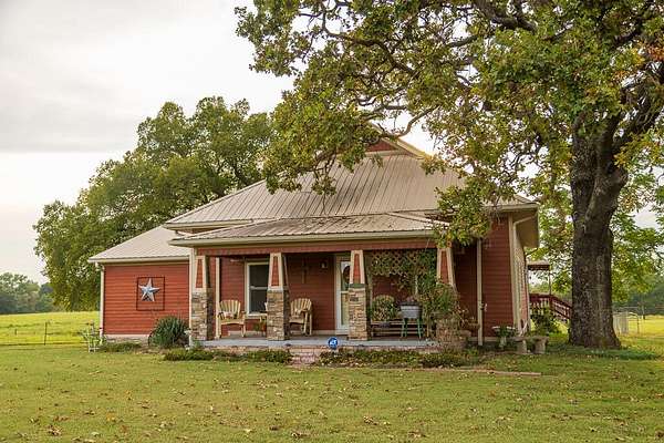65.4 Acres of Land with Home for Sale in Nevada, Missouri