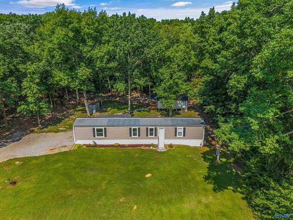 13.6 Acres of Land with Home for Sale in New Hope, Alabama