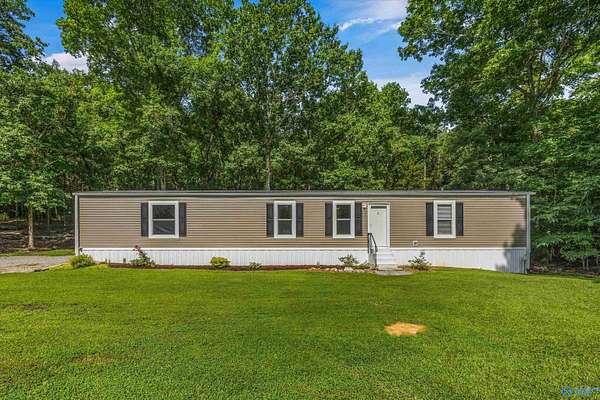 13.6 Acres of Land with Home for Sale in New Hope, Alabama