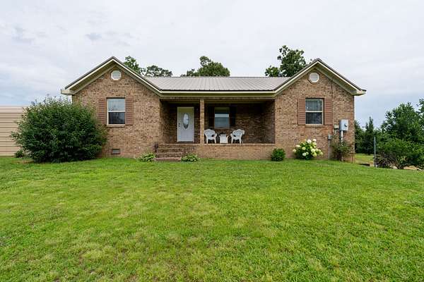 5 Acres of Land with Home for Sale in Iron City, Tennessee