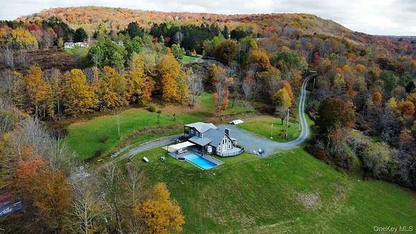 54.6 Acres of Recreational Land with Home for Auction in Parksville, New York