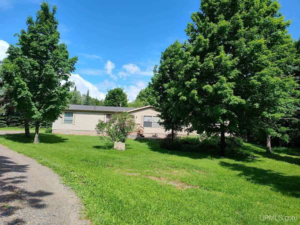 5.24 Acres of Land with Home for Sale in Iron River, Michigan