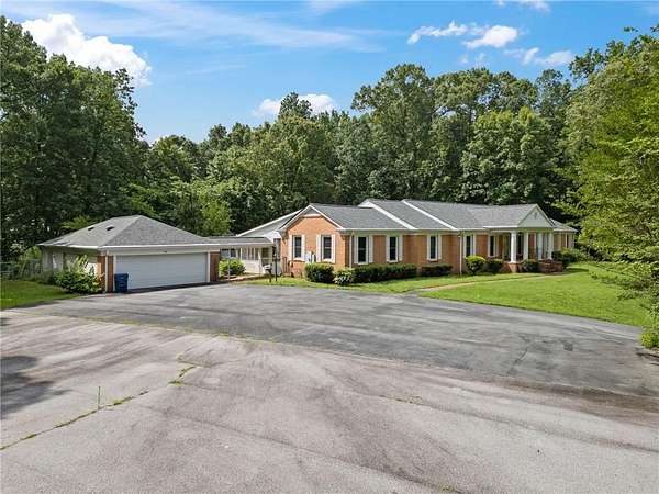 5.52 Acres of Land with Home for Sale in Dallas, Georgia