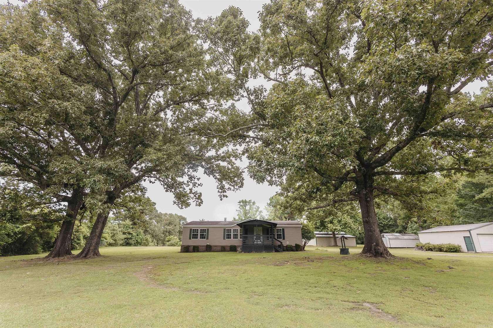 5 Acres of Land with Home for Sale in Redfield, Arkansas