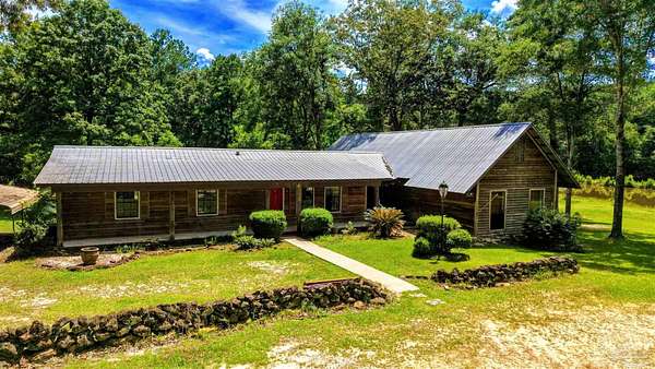 5.2 Acres of Land with Home for Sale in Millry, Alabama