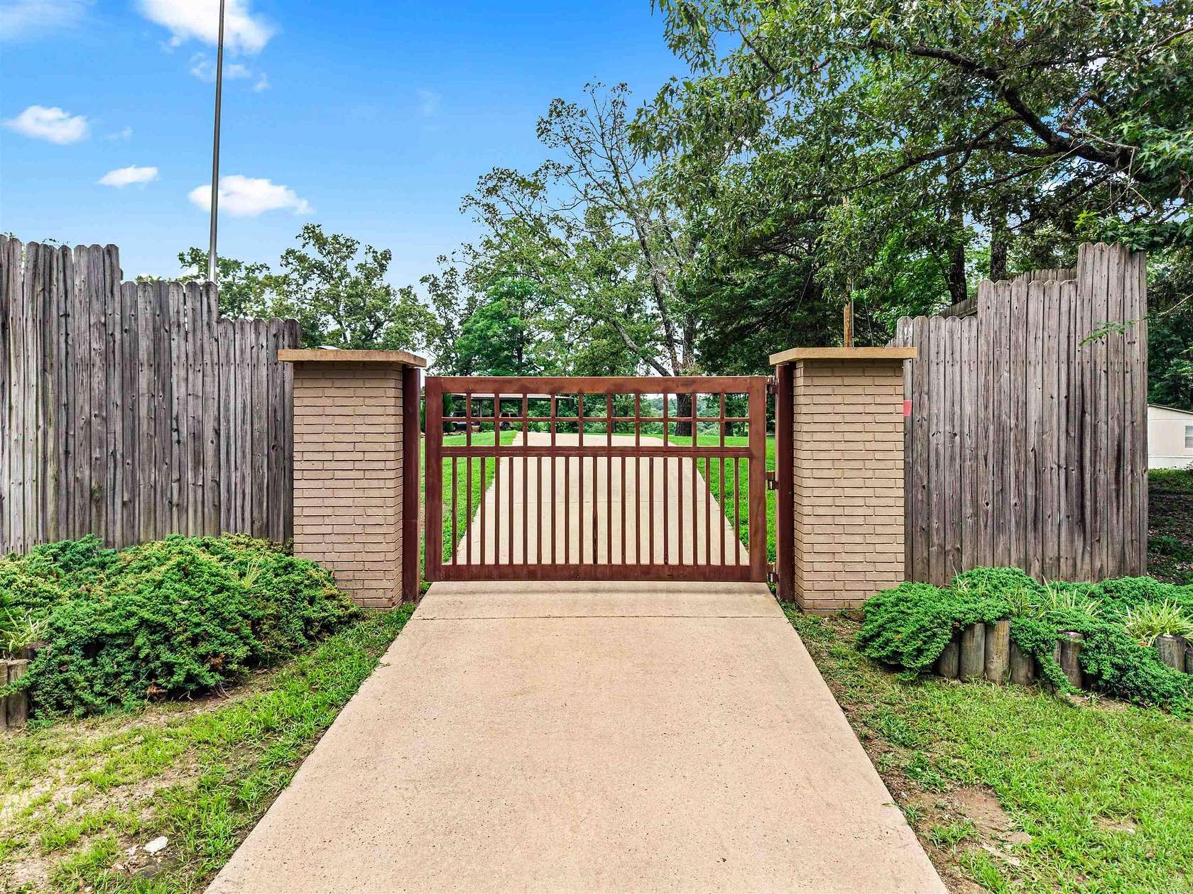 10 Acres of Land with Home for Sale in Pearcy, Arkansas