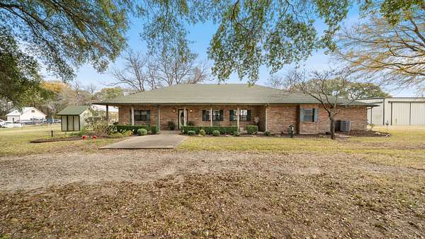 10.9 Acres of Land with Home for Sale in Scurry, Texas