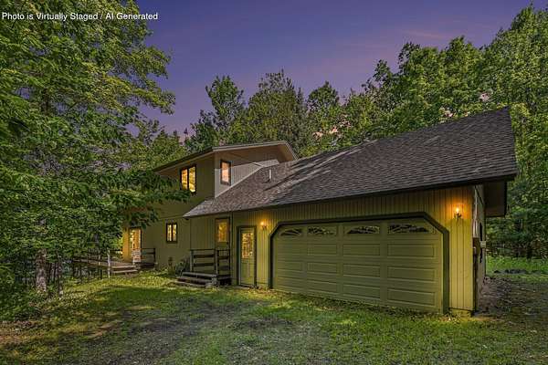 11.4 Acres of Recreational Land with Home for Sale in Indian River, Michigan