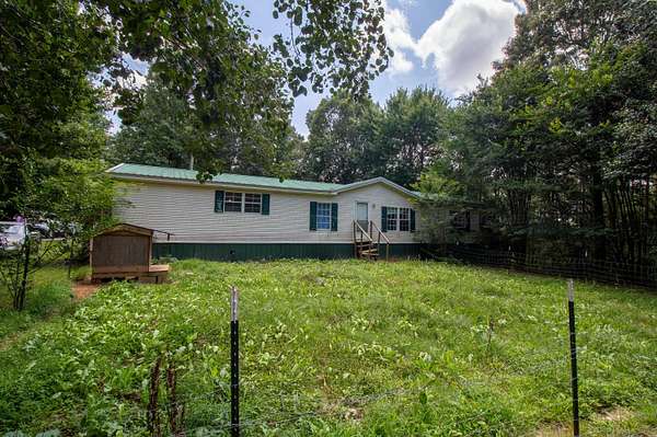 3 Acres of Land with Home for Sale in Haleyville, Alabama