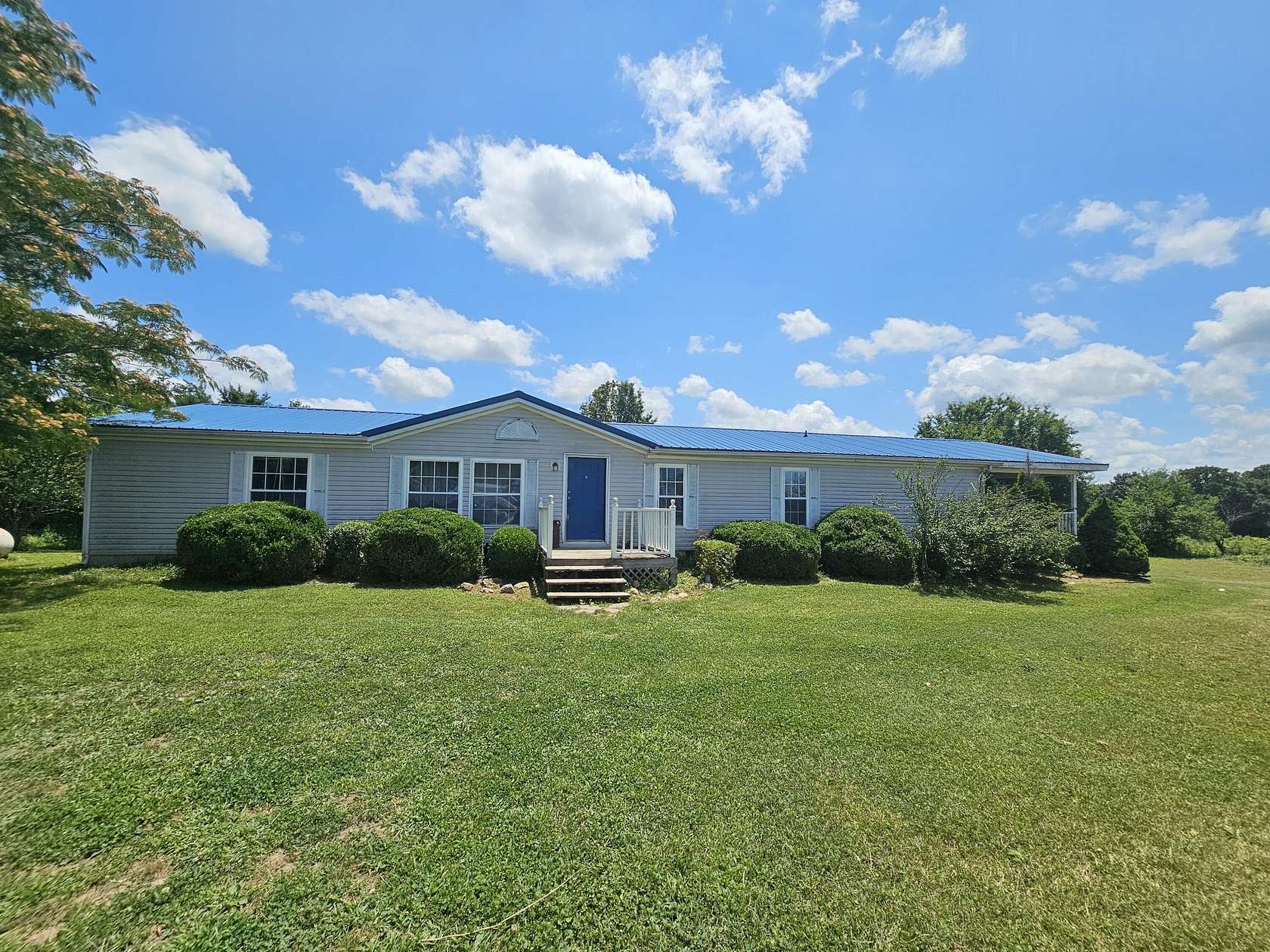 9.76 Acres of Land with Home for Sale in Phillipsburg, Missouri