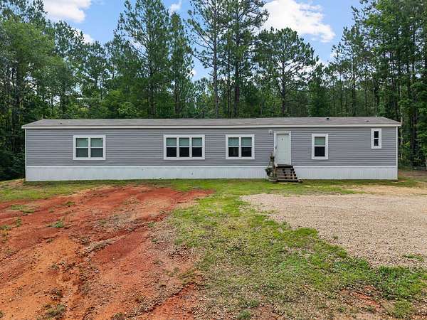 5.89 Acres of Land with Home for Sale in Lumberton, Mississippi