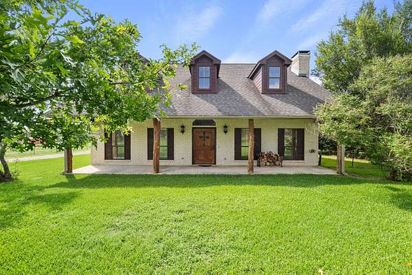 25.7 Acres of Land with Home for Sale in Poetry, Texas