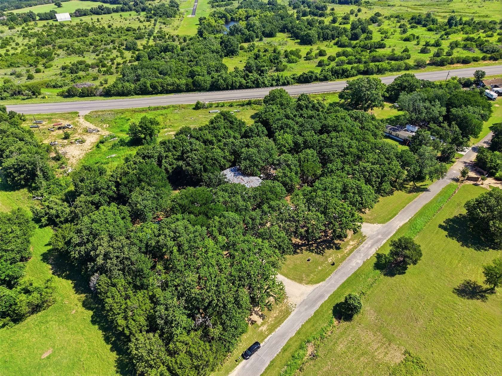 5 Acres of Land with Home for Sale in Glen Rose, Texas
