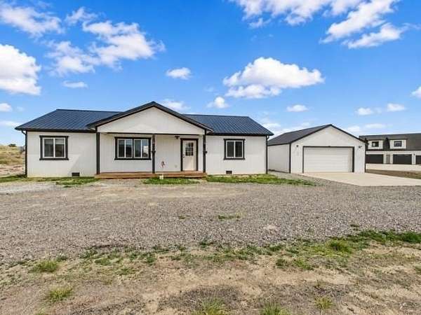 1.5 Acres of Land with Home for Sale in Powell, Wyoming